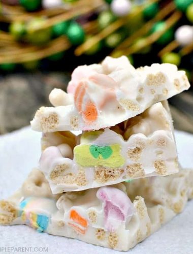 Lucky Charms Cereal Treats for St. Patrick's Day - Lucky Charms candy bark is an easy recipe to make for St. Patrick's Day! The marshmallows make these Lucky Charm bars cute and tasty! Check out the simple ingredient list!