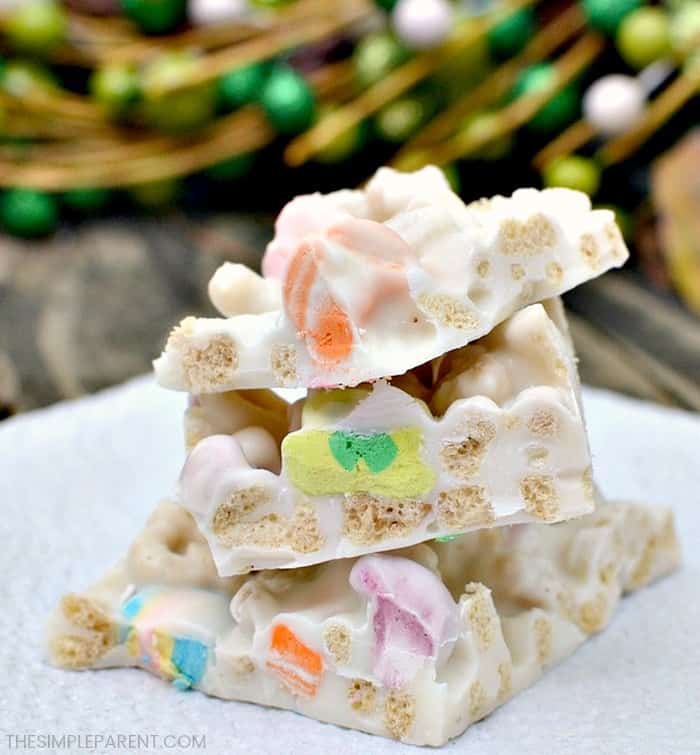 Lucky Charms Cereal Treats for St. Patrick's Day - Lucky Charms candy bark is an easy recipe to make for St. Patrick's Day! The marshmallows make these Lucky Charm bars cute and tasty! Check out the simple ingredient list!