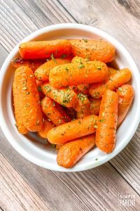 Buttery oven roasted carrots in a bowl