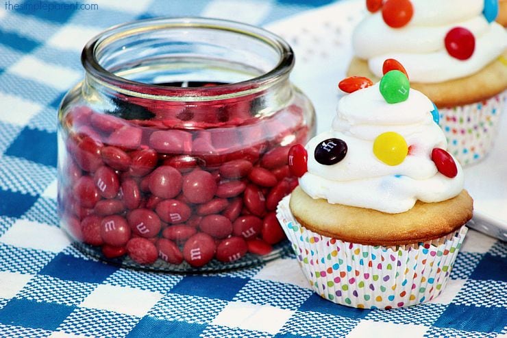 These easy M&M Cupcakes take a box cake mix and add some pops of color and flavor to it! If you're looking for fun and easy cupcake recipes, try this one!