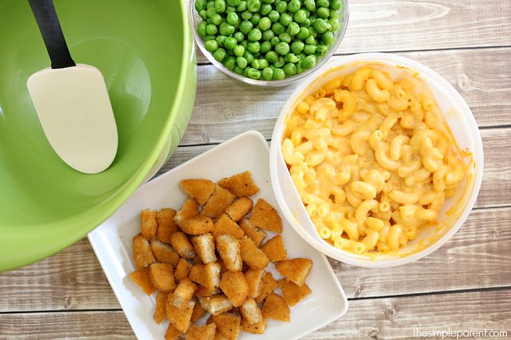Need an easy family dinner idea? Make this quick and easy Chicken Nugget Macaroni and Cheese casserole! Kid-friendly and so easy to make!