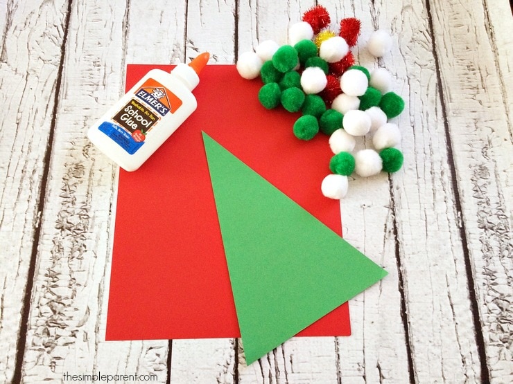 Let the kids decorate their own Christmas tree with this Pom Pom Christmas Tree craft! 