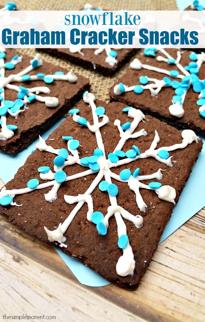 Embrace winter with the kids! Make these easy Snowflake Graham Cracker Snacks on a snow day or just for a fun after school treat!