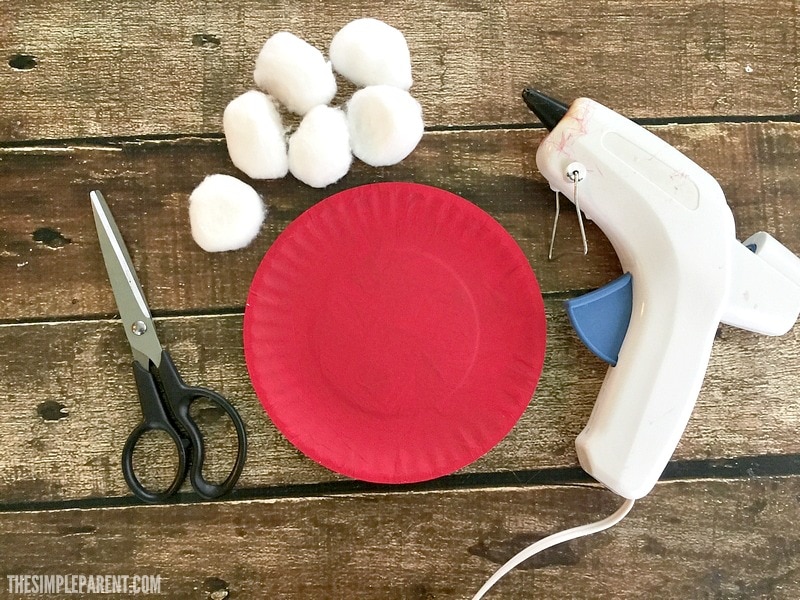Make this easy paper plate Santa Hat craft with your kids this holiday season!