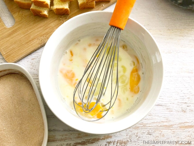 Mix eggs and milk together to make cinnamon french toast sticks!