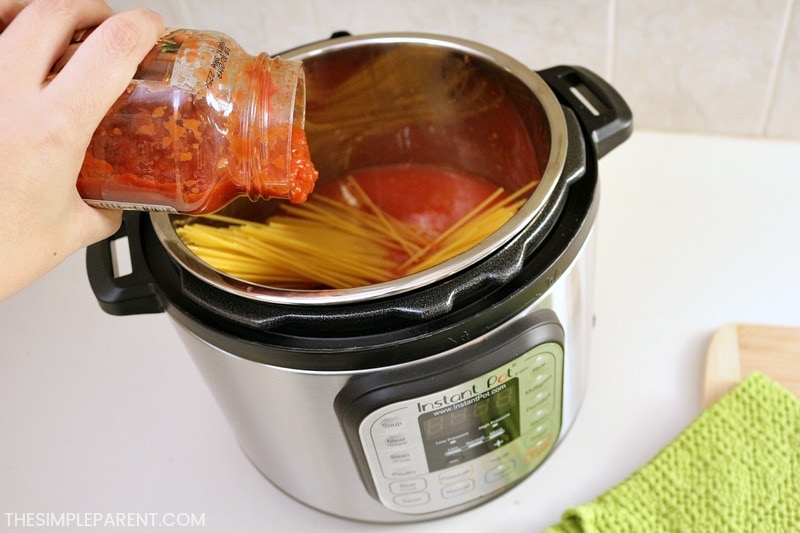 Instant Pot Spaghetti and Meatballs Recipe - This easy Instant Pot Recipe only takes minutes to prepare. It's one of the easiest electric pressure cooker recipes I've tried! The noodles come out great in the sauce! I've added it to my easy recipes for the busiest nights!