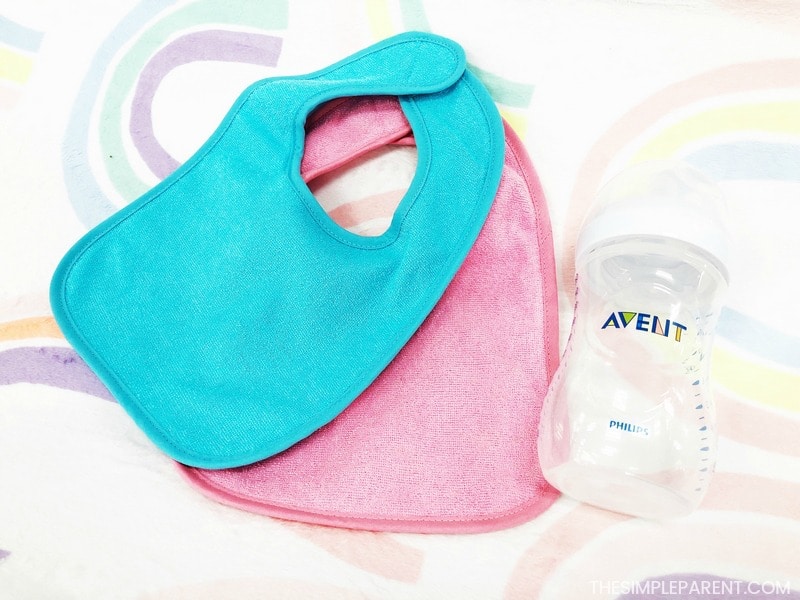 Bibs and burp cloths are great newborn gift ideas to help with feeding!