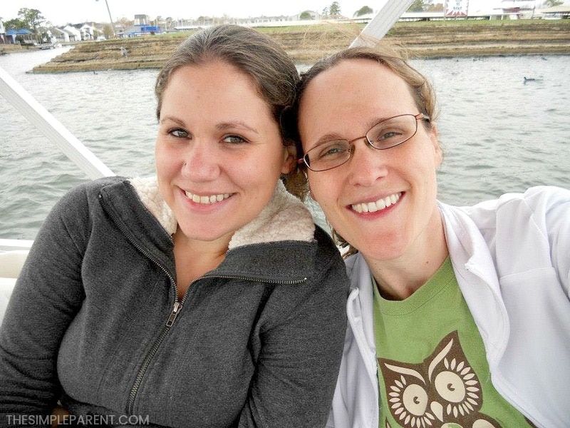 Two sisters on a boat on the lake