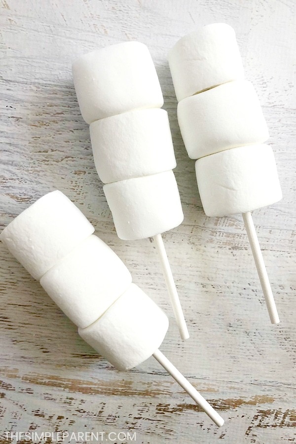 Marshmallows on lollipop sticks