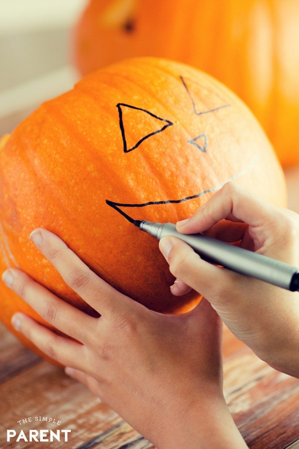 Decorating a pumpkin