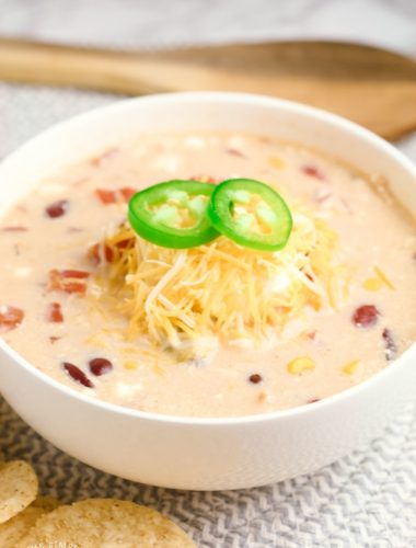 Crock Pot Cream Cheese Chicken Chili is one of the best slow cooker chili recipes out there if you're craving a creamy chicken recipe! You can use a variety of beans to make this white chili recipe! It makes a great dinner for families and can also be made low carb for and gluten free!