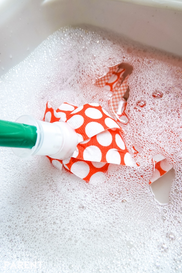 The Libman Company Wonder Mop in soapy water is one of our Spring Cleaning tips
