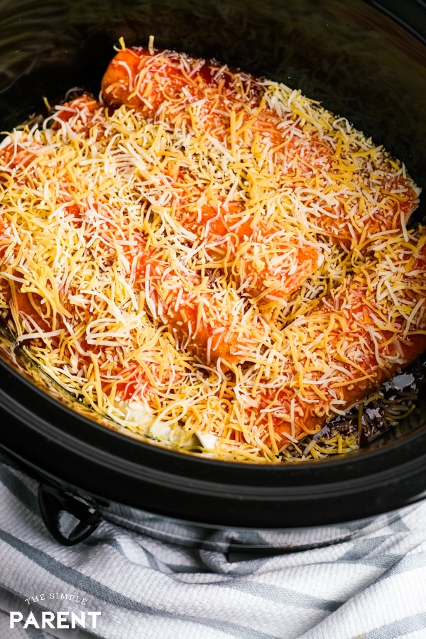 Chicken enchiladas with cheese in a slow cooker