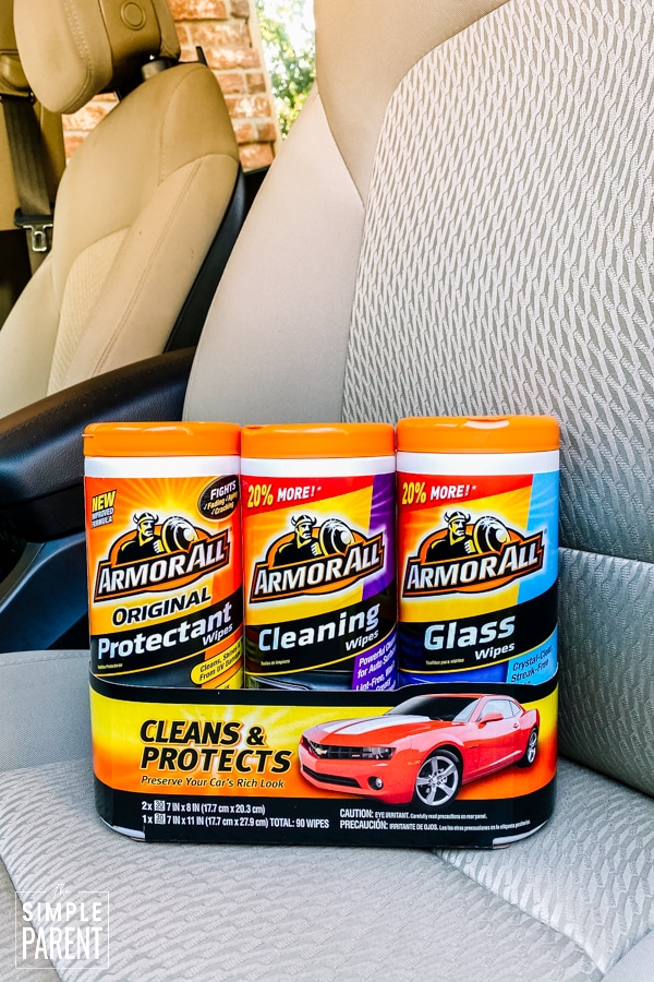 Armor All cleaning wipes 3 pack sitting on a car seat