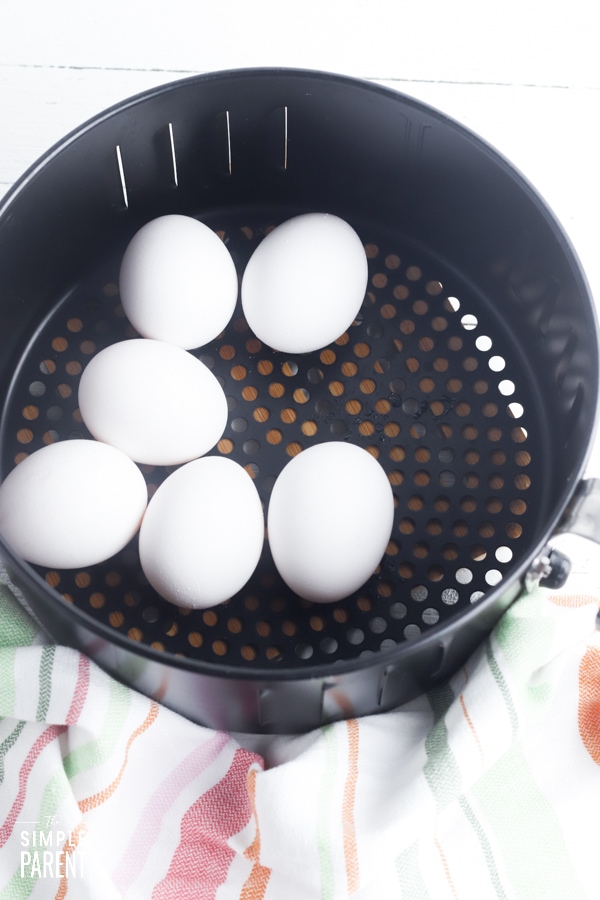 Large eggs in an air fryer basket
