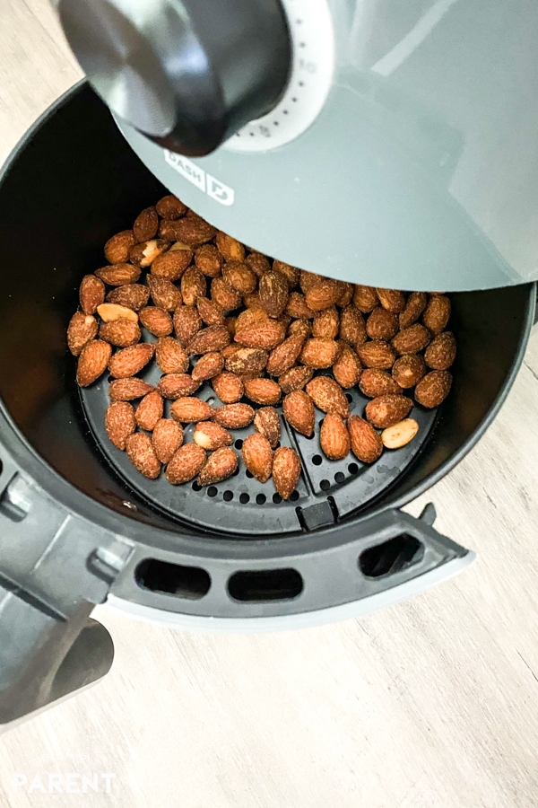 Air Fryer Almonds in the basket of the fryer