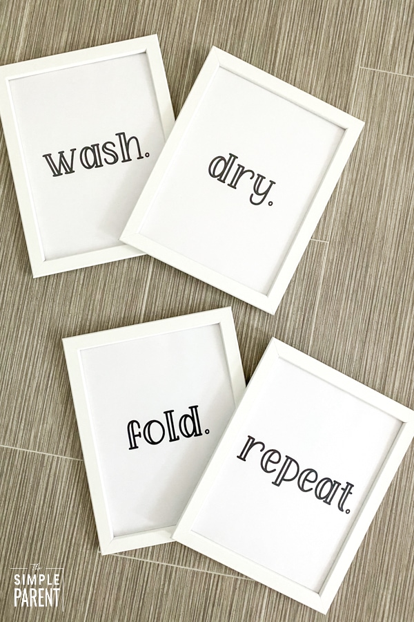 Free printable laundry room signs in white frames