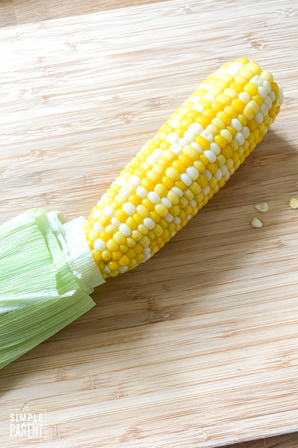 Ear of corn with husk removed after heating in the microwave