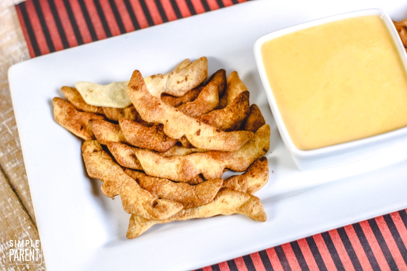 Bat shaped tortilla chips with cheese dip