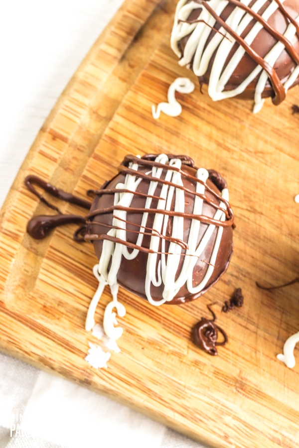 Hot chocolate bomb drizzled with melted chocolate