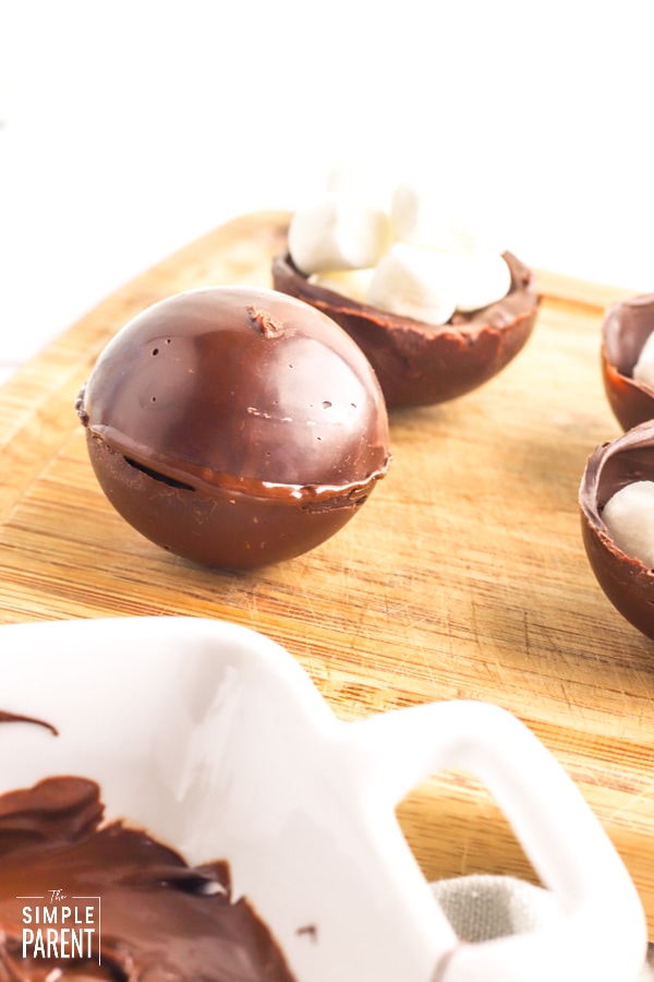 Sealing cocoa bombs with melted chocolate