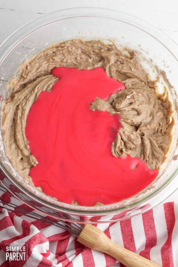 Red velvet cake ingredients in a mixing bowl