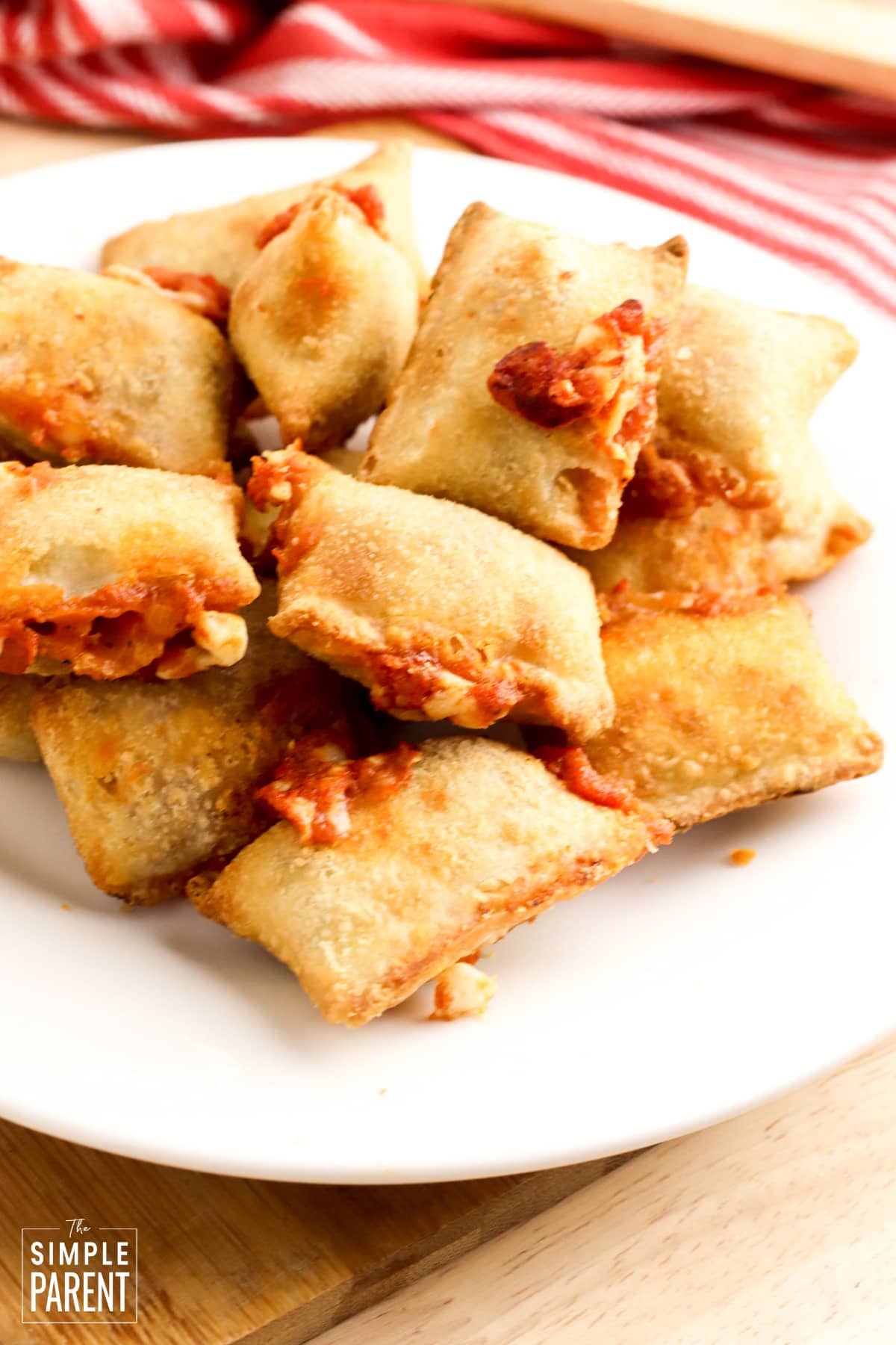 Cheese pizza rolls on a white plate