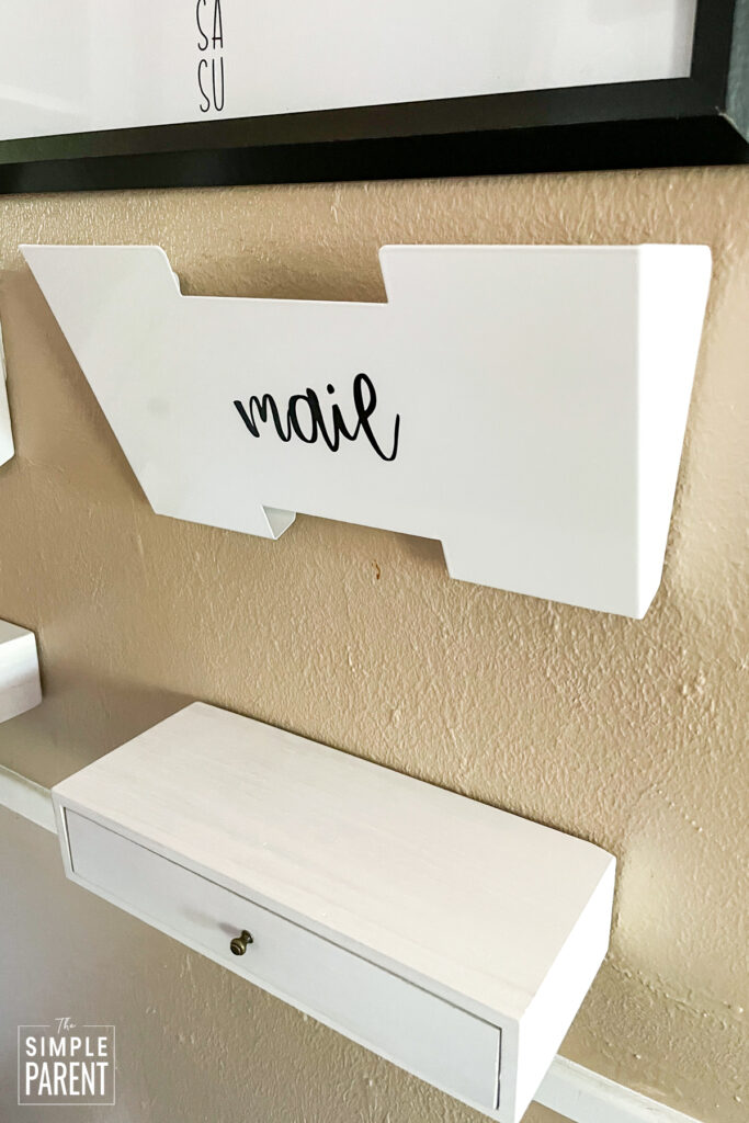 White shelf customized with black vinyl word mail