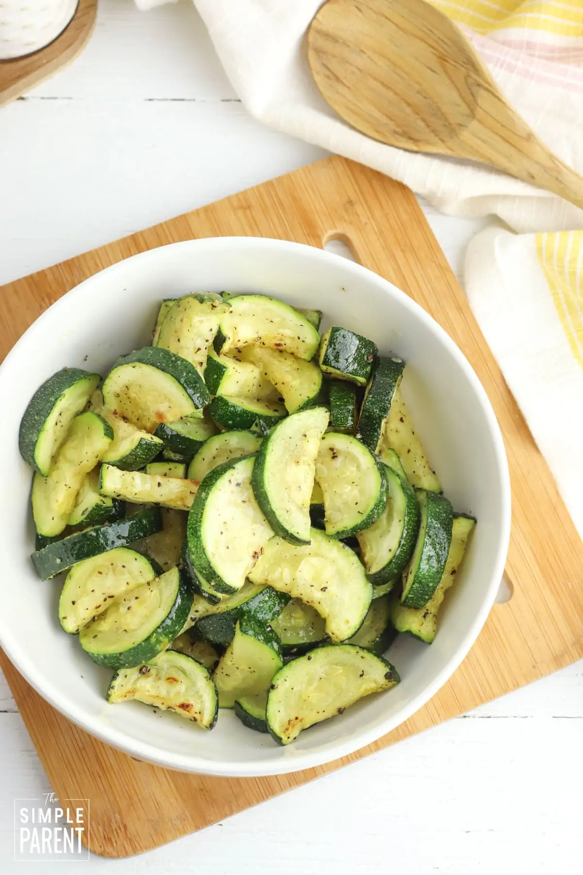 Air Fryer Zucchini in white serving bowl