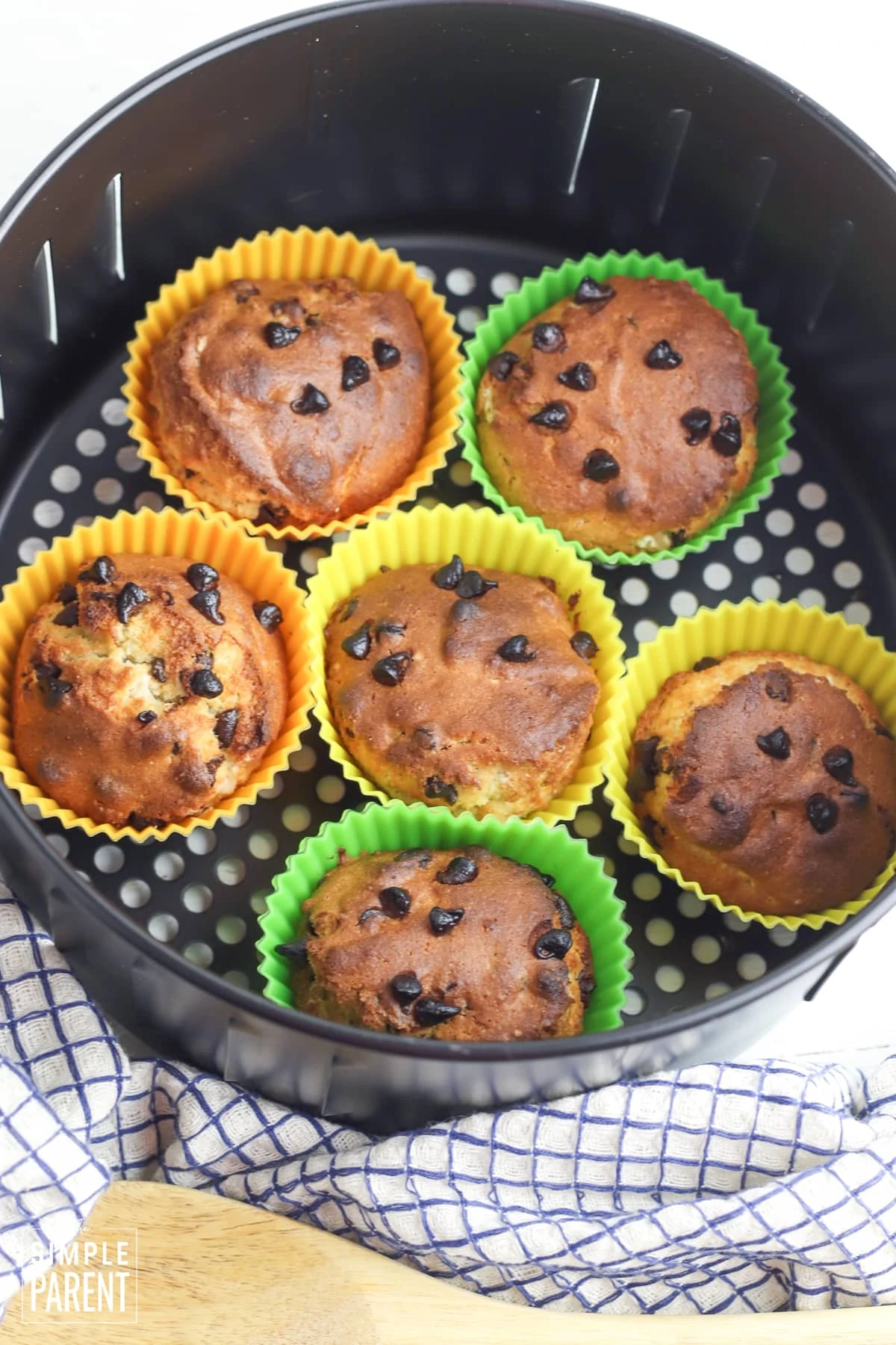 Baked muffins in air fryer basket