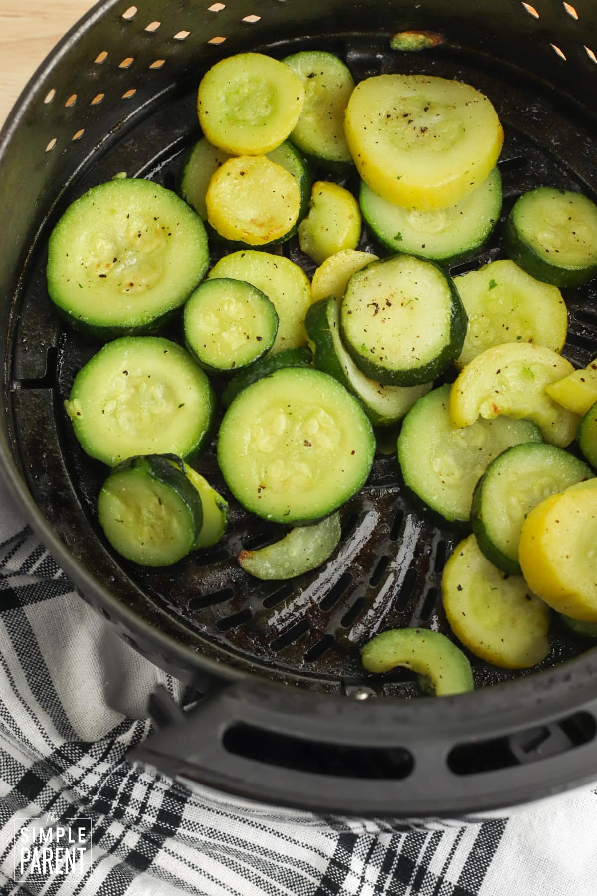 Squash and zucchini slices in air fryer basket