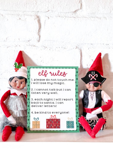 Two elves sitting with Elf on the Shelf Rules printable