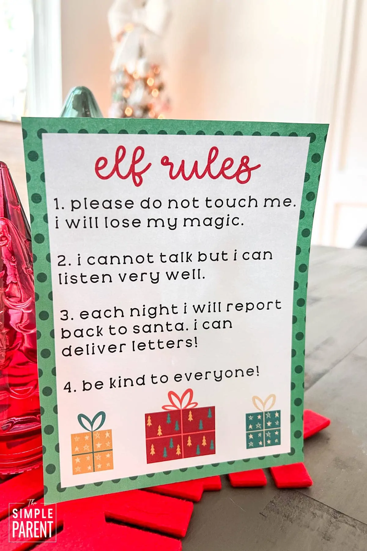 Elf on the Shelf rules printable in front of Christmas tree