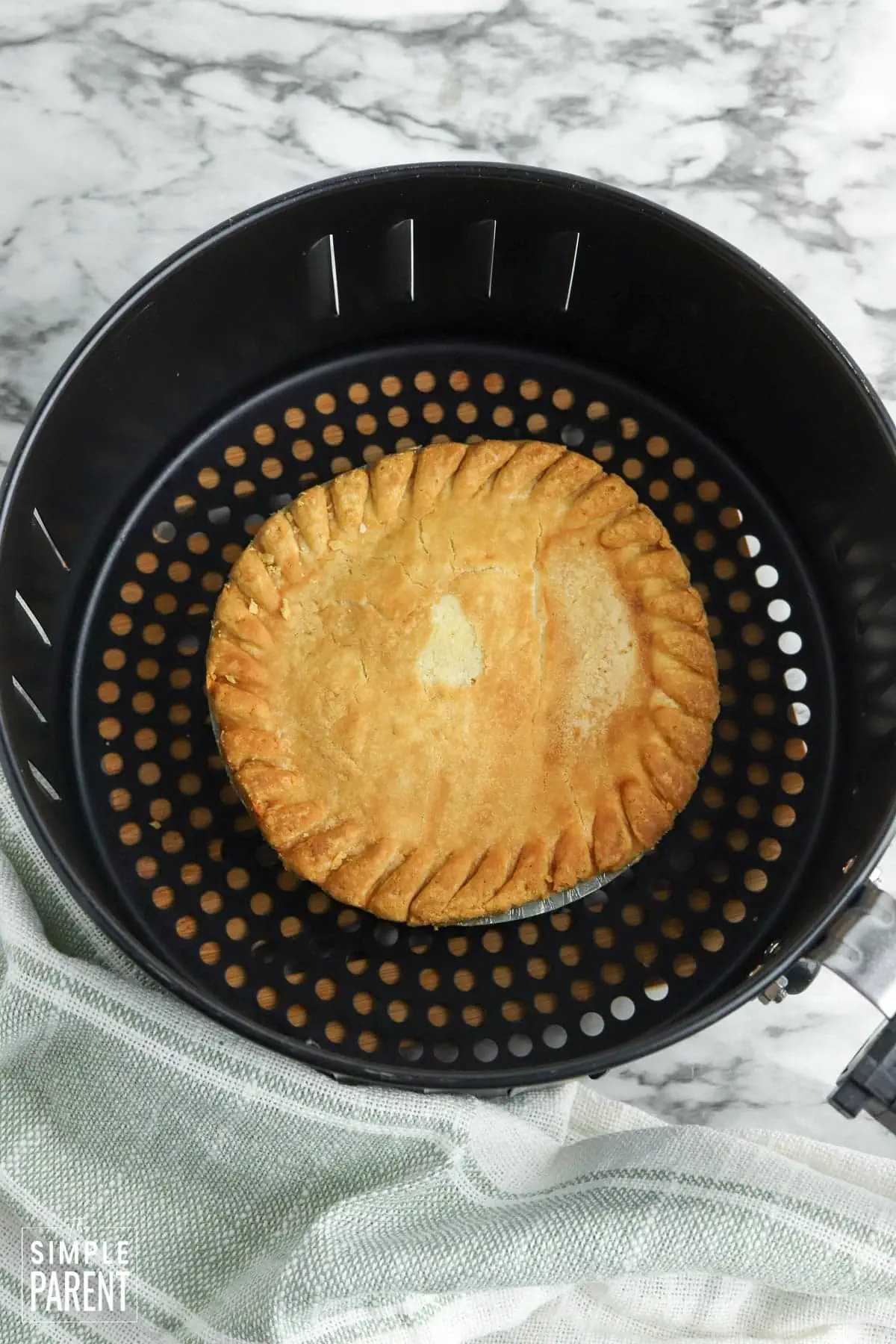 Frozen pot pie in air fryer basket