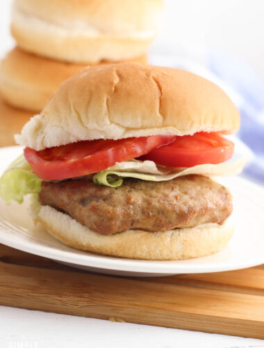 Air Fryer turkey burgers on white bun with lettuce and tomato