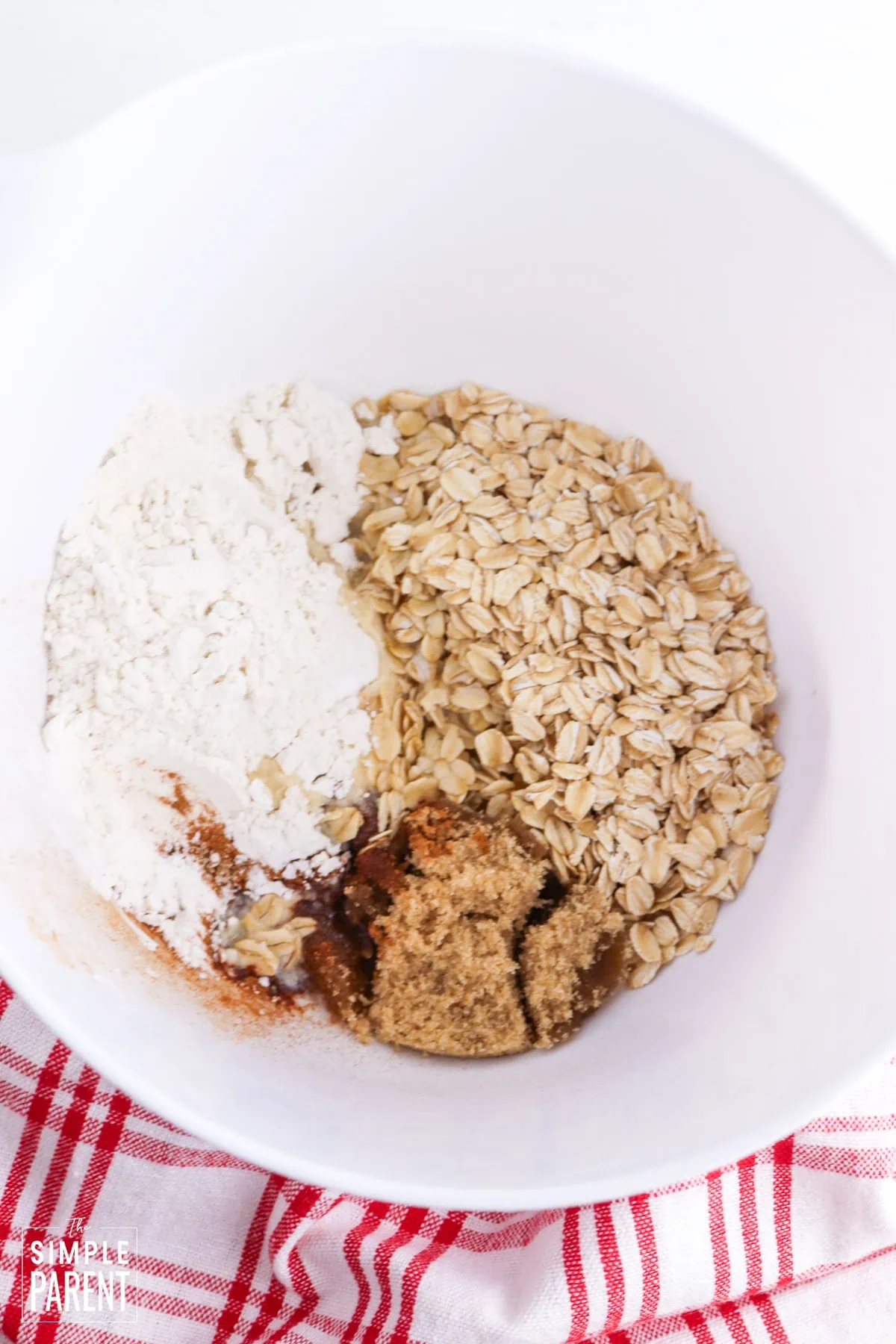 Apple Crisp topping ingredients in a white mixing bowl