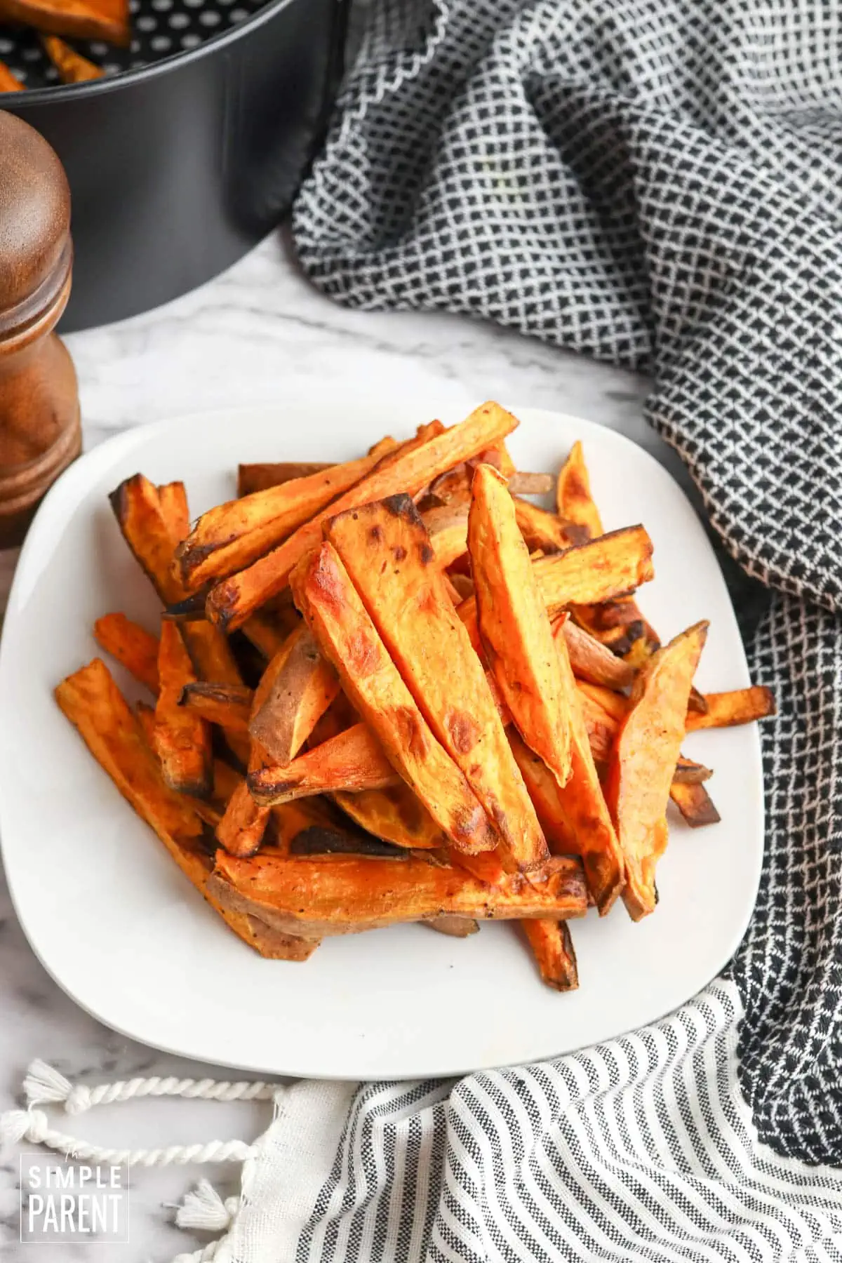 Air Fryer Sweet Potato Wedges on white plate