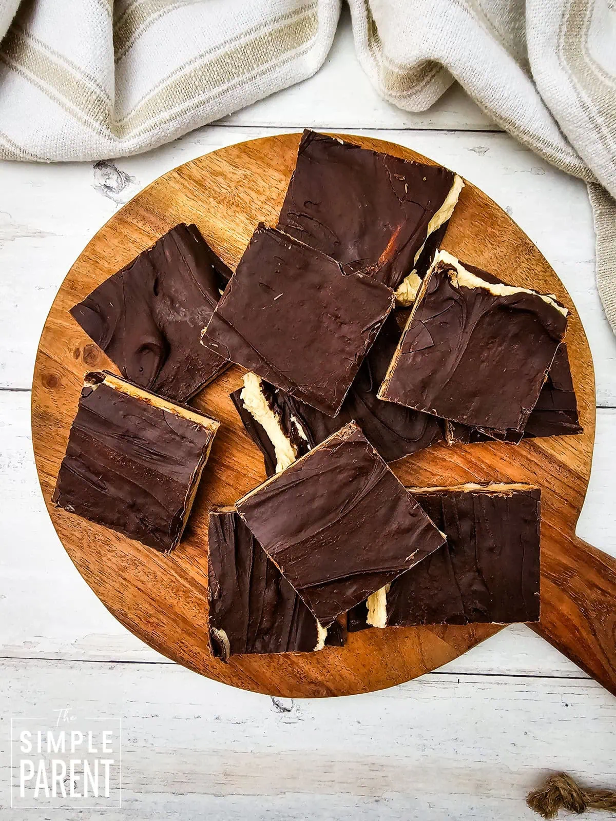 Cookie dough bark pieces on wooden serving dish