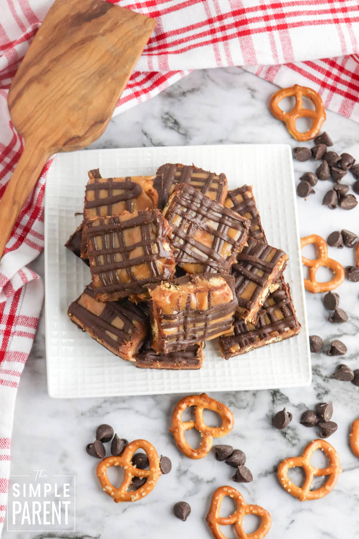 Plate of Chirstmas chocolate caramel pretzel bark