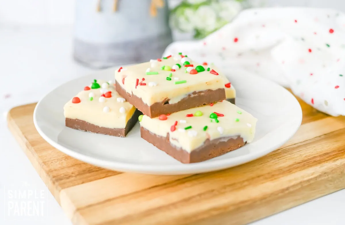 Christmas chocolate fudge pieces stacked on white plate