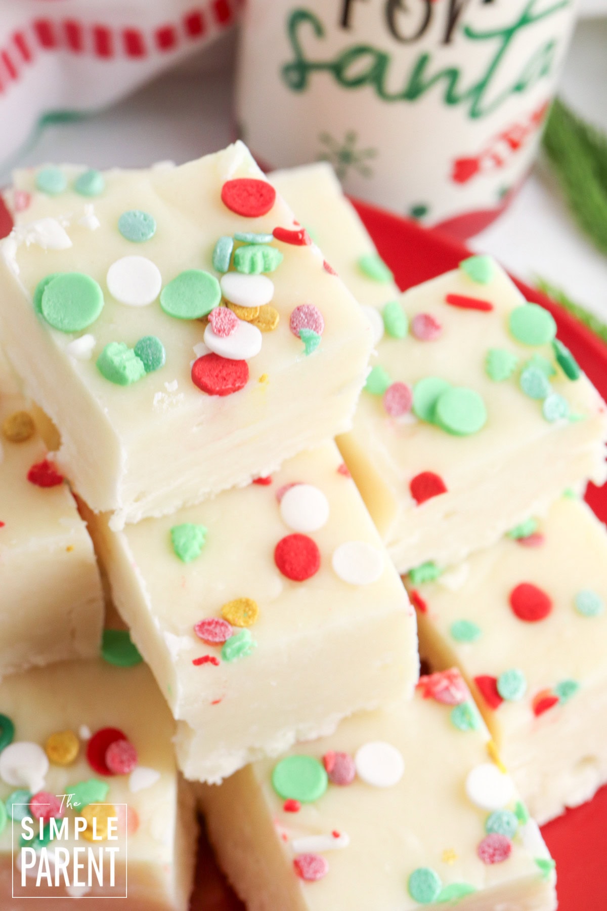 christmas cookie fudge pieces on red plate