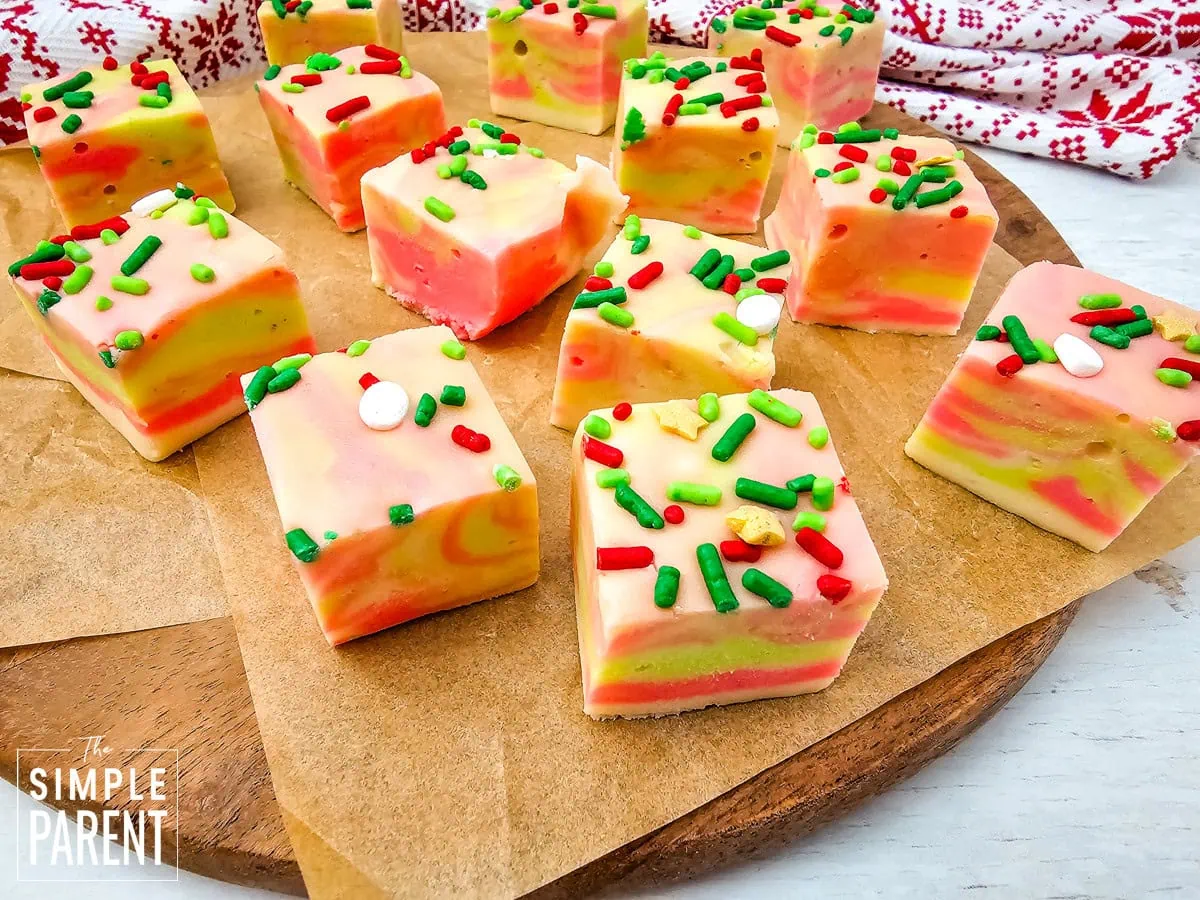 White chocolate fudge with red and green swirls and Christmas sprinkles