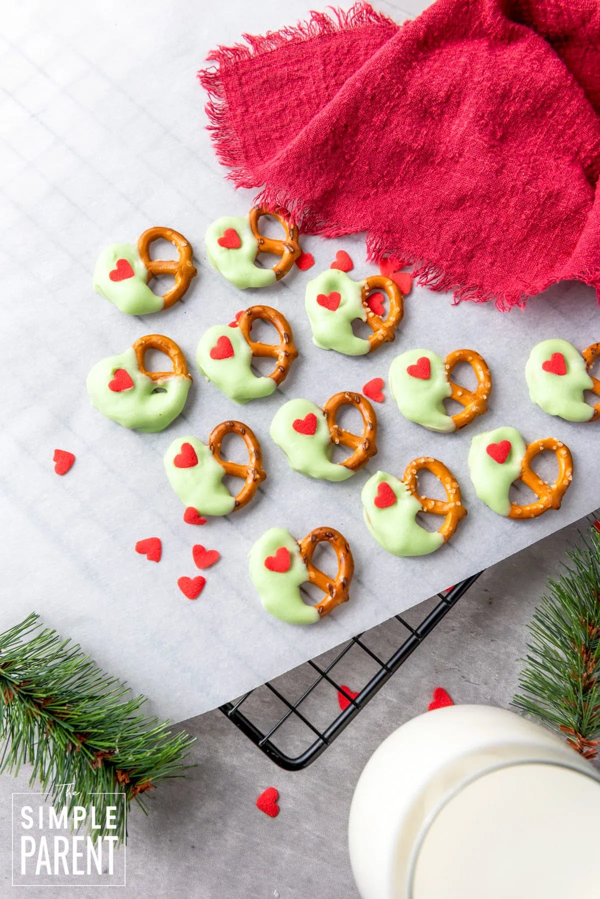 Grinch Pretzels on parchment paper