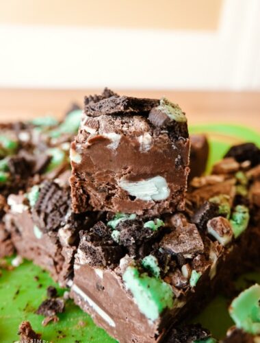 Mint Chocolate Frosting Fudge pieces in a stack