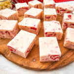 Pieces of Strawberry Fudge on wooden serving plate