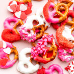 Valentine Pretzels dipped in red, white and pink cholcate on white counter