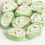 Veggie pinwheels on white plates