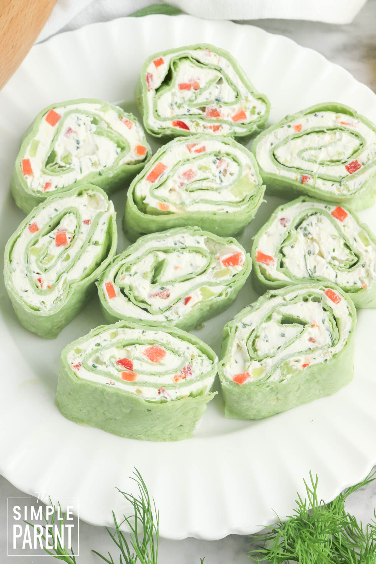 Veggie pinwheels on white plates