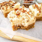 Carrot Cake Blondies on wooden serving board