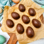 Homemade Peanut Butter Eggs on wooden serving board